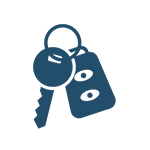 Blue key with keychain isolated on white background.